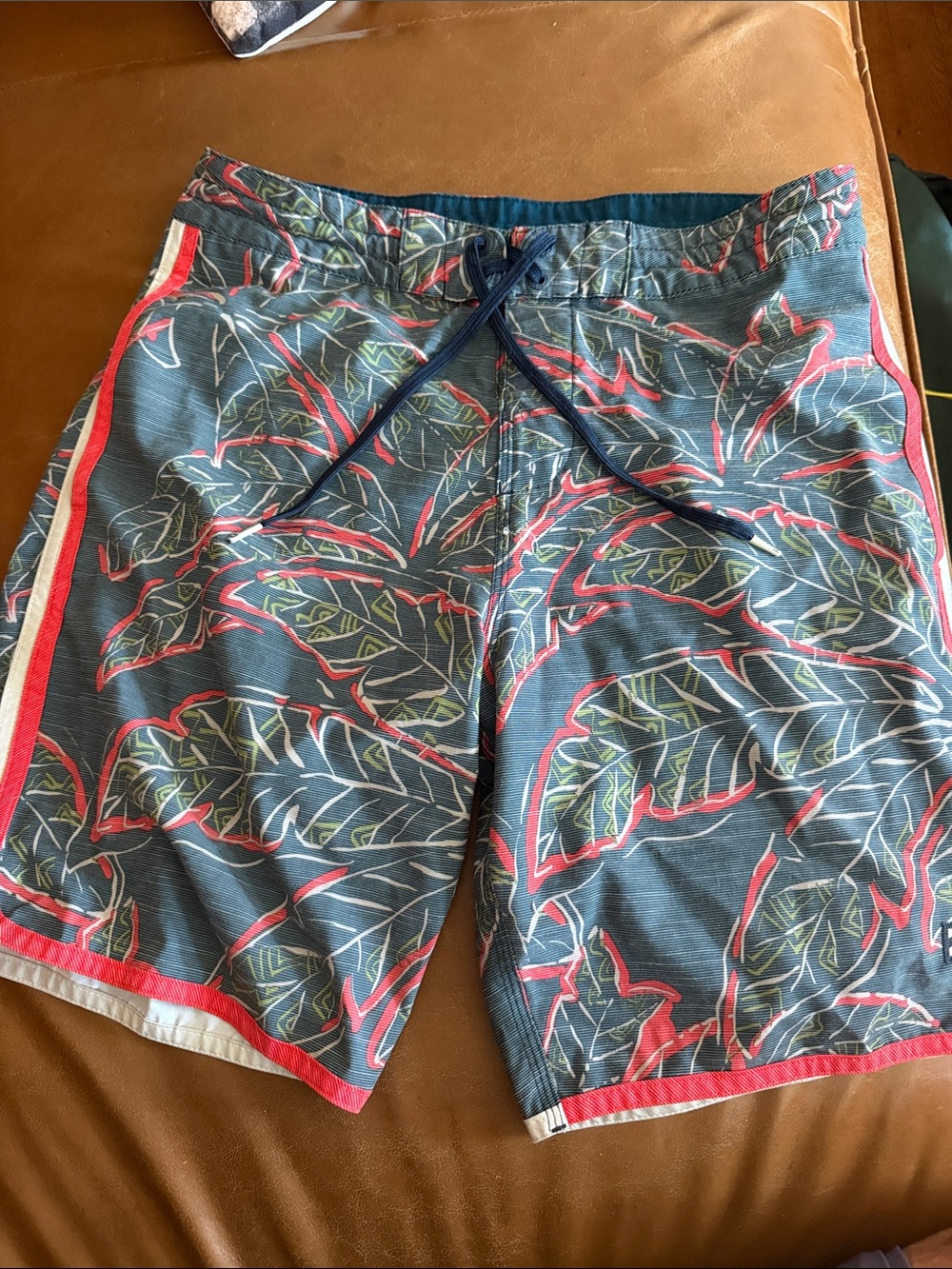 Billabong Blue Tropical Leaf Board Shorts with Red Accents size 29”waist